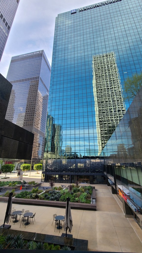 Los Angeles literary tour. Skyscraper reflection seen on another skyscraper.