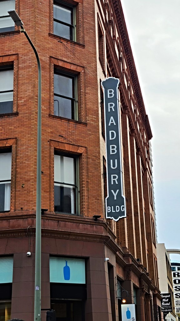 Los Angeles literary tour. Ray Bradbury building sign on side of brick structure in LA