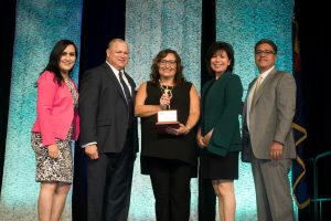 Monica Brown receiving Profiles of Success award